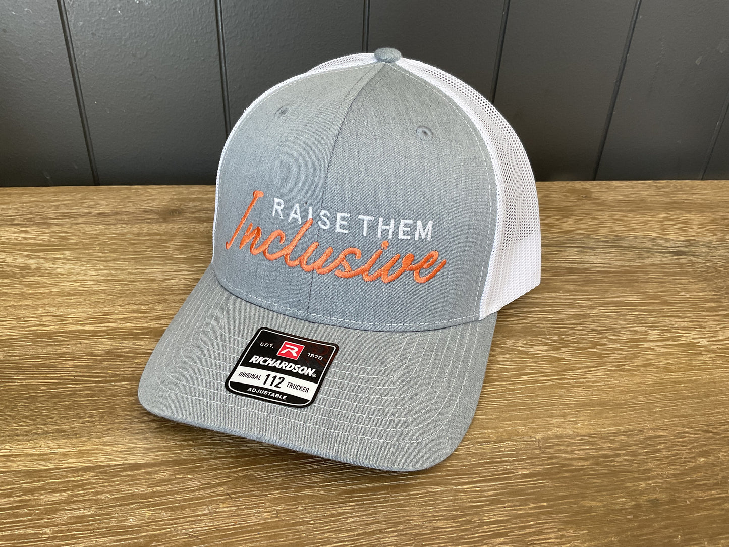 Raise Them Inclusive TruckerHat